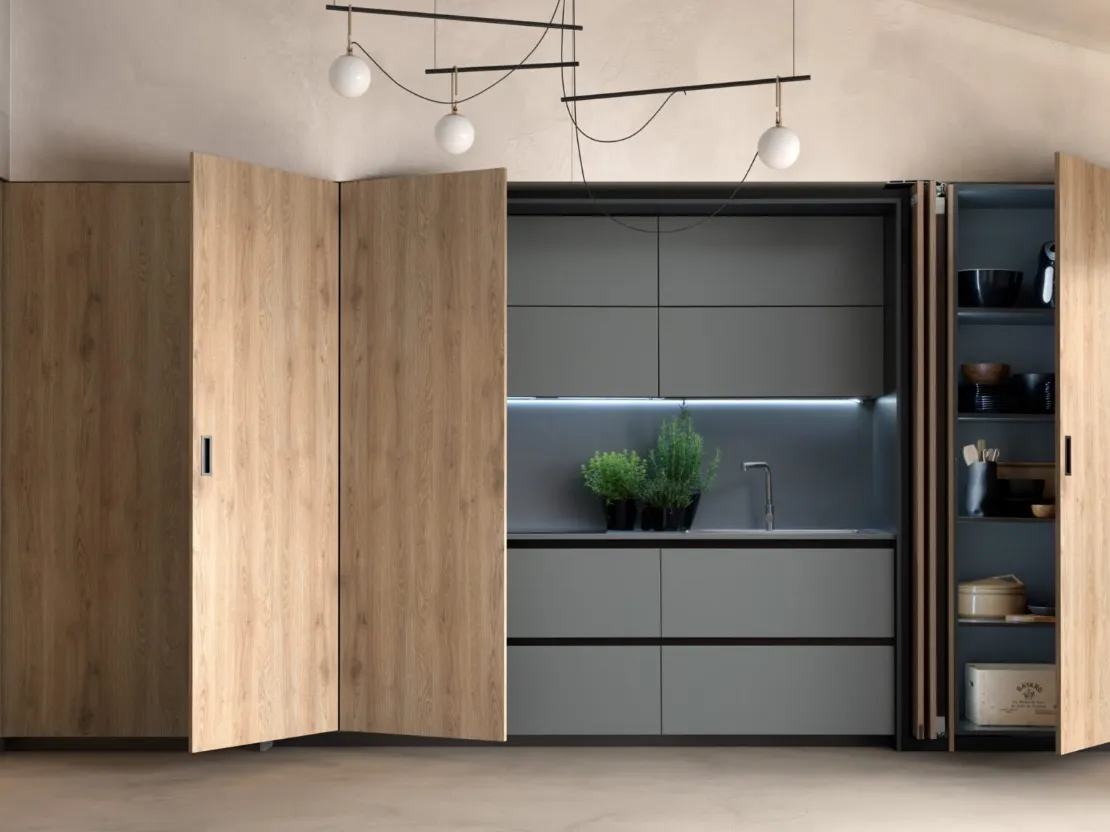 Cucina Moderna con isola Infinity 03 con sistema a scomparsa di Mobilegno